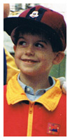 At Disneyworld with Mickey Mouse, giving my favorite expression ever.